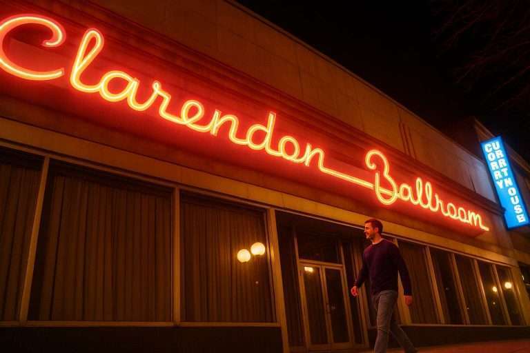 Arlington VA 41 Man walking past Clarendon Ballroom's neon sign at night.