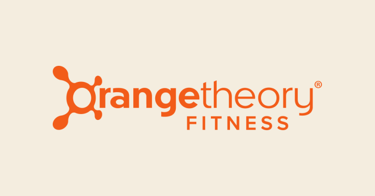 Arlington VA 29 Orangetheory Fitness logo featuring bold orange text “orangetheory” with a molecular-style orange icon on the left, and “FITNESS” in uppercase letters below.