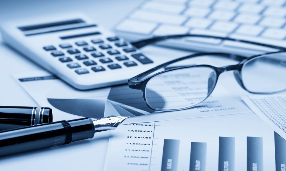 Financial documents and a calculator