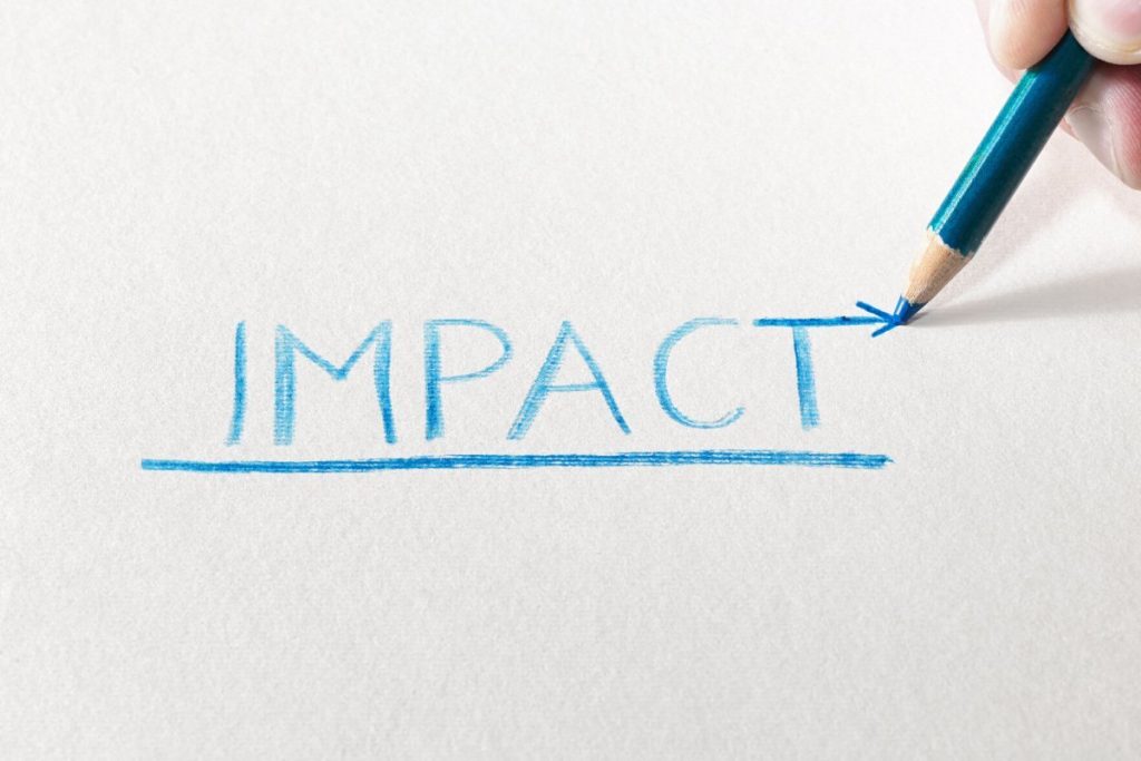 Someone drawing impact with a pencil