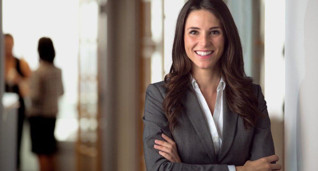 landlord smiling in her office