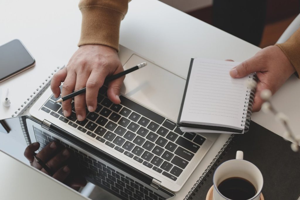person using a computer to screen tennants