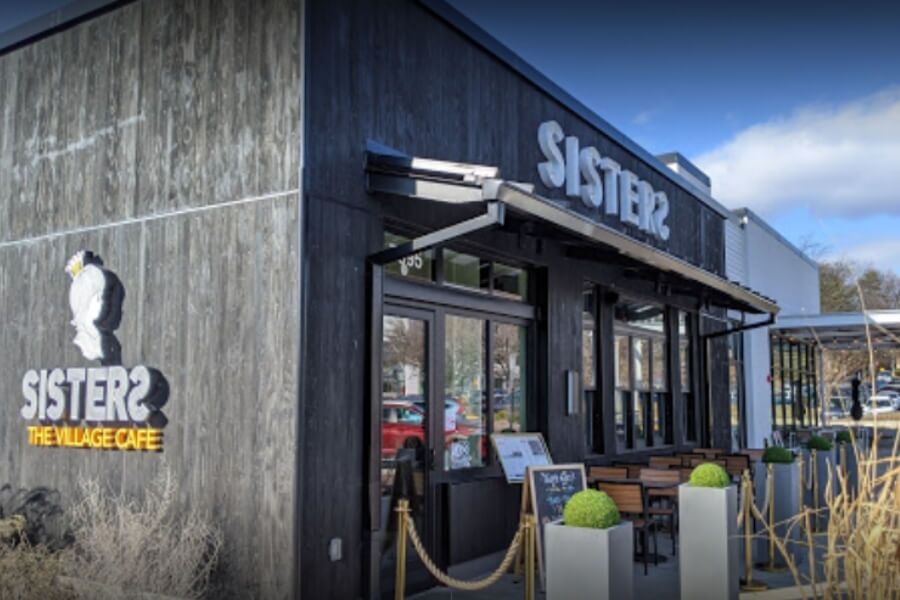 view of the Sisters Thai restaurant and their outdoor seating option