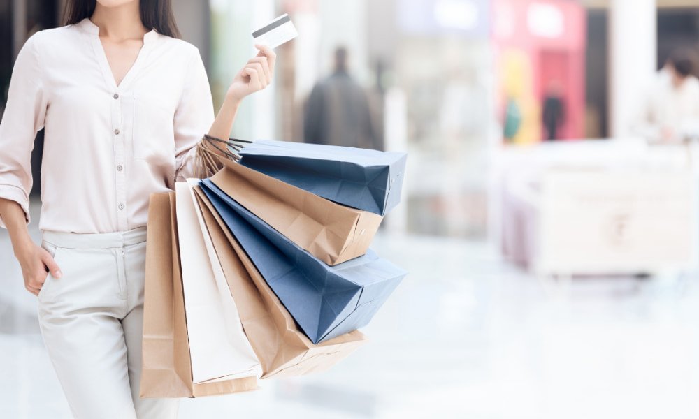 Person shopping in Bethesda MD with a lot of bags